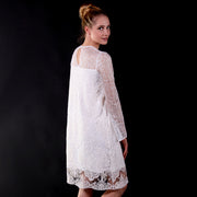 Long sleeved web and lace white knee-length dress